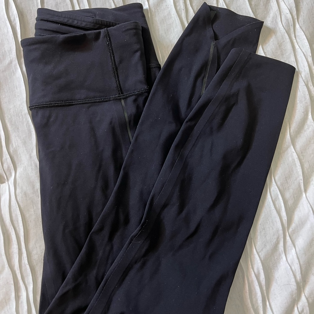 LULULEMON high waisted black tights size 4